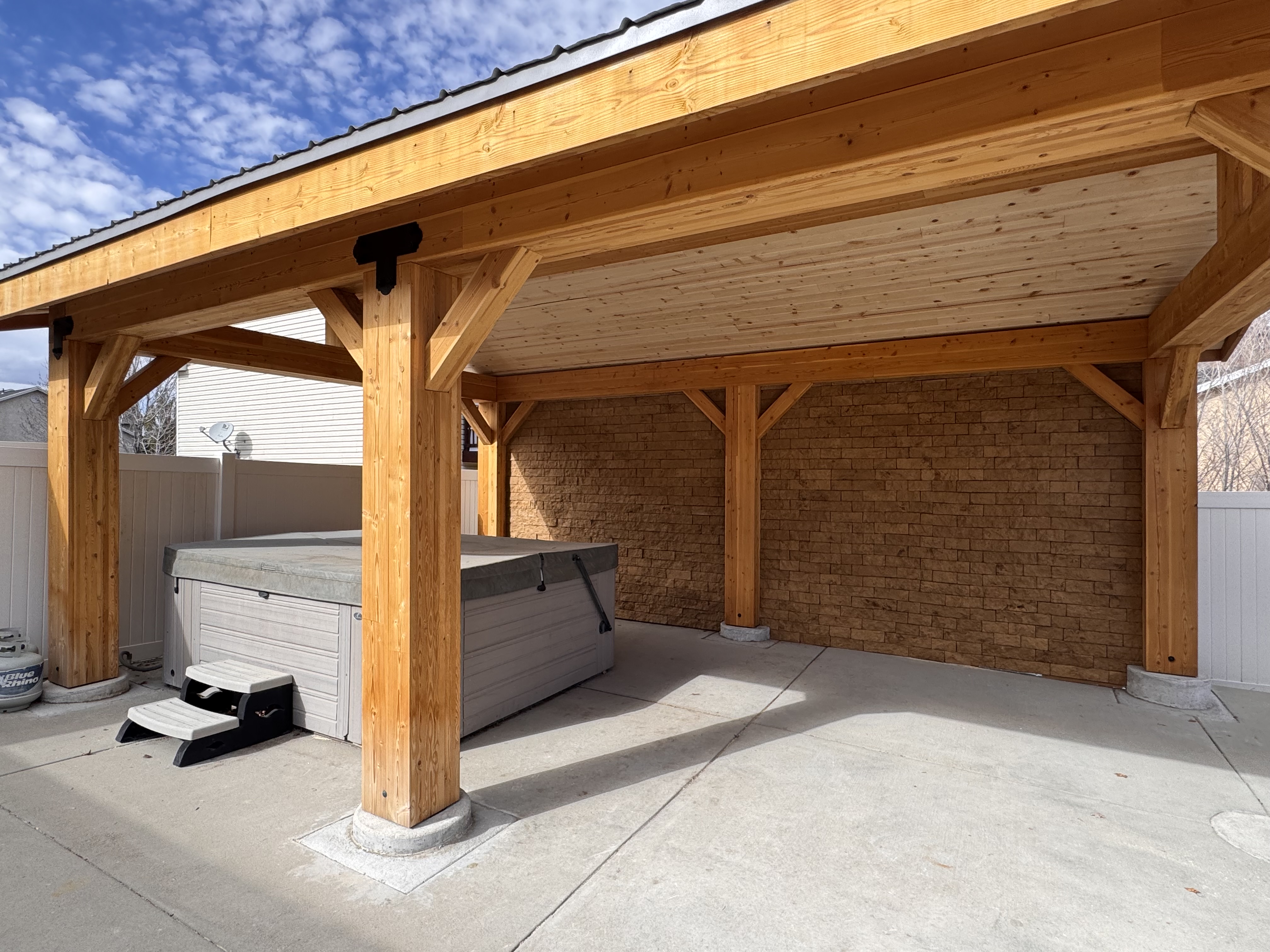 Timber Pavilion Improvement with Tongue and groove Ceiling and Custom Evolve Stone Accent Wall